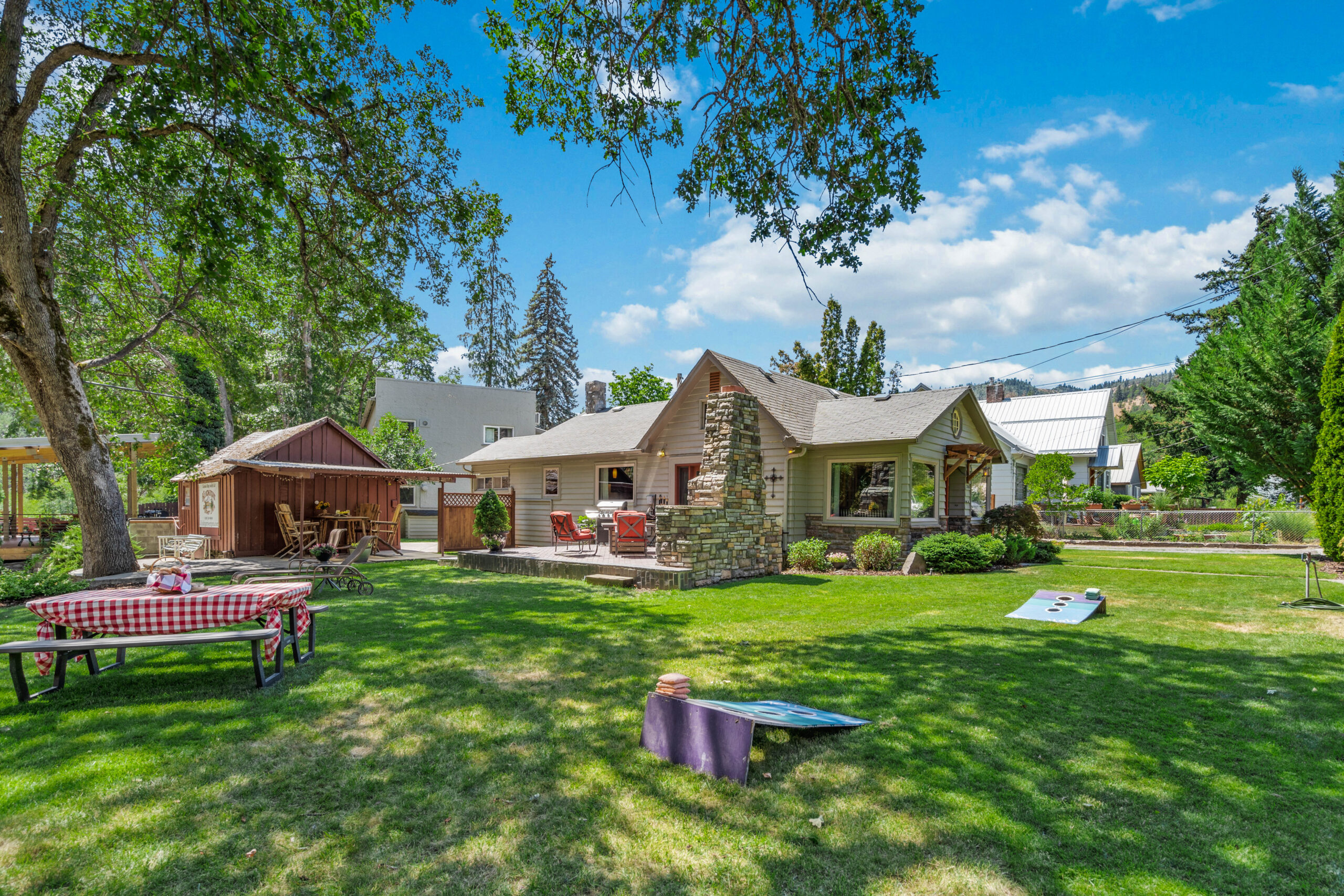 A large yard with many tables and chairs.